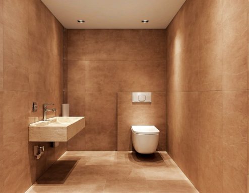 Modernes Badezimmer mit Waschbecken und WC, Wände in warmen Beigetönen.
